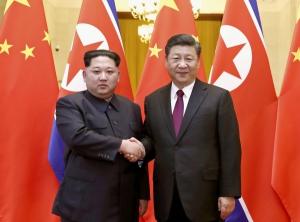 北 "김정은, 시진핑 방북 초청…양측 협력 강화"