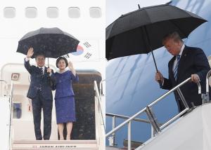우산 쓴 文대통령에 &apos;일본의 홀대&apos; 논란… 트럼프도 우산 썼다