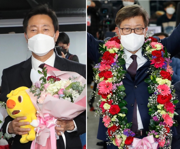 오세훈 서울시장 후보(왼쪽)와 박형준 부산시장 후보(오른쪽)가 각각 꽃다발을 받고 기뻐하고 있다. (사진 = 연합뉴스)